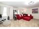 Bright bonus room with sectional sofa and large window at 14217 Ridgewater Way, Charlotte, NC 28278