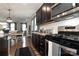 Open kitchen with stainless steel appliances and granite countertops at 14217 Ridgewater Way, Charlotte, NC 28278