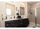 Modern bathroom with double vanity and a large walk in shower at 14217 Ridgewater Way, Charlotte, NC 28278