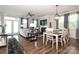 Bright dining room with hardwood floors and a view to living room at 14217 Ridgewater Way, Charlotte, NC 28278