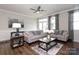 Spacious living room featuring hardwood floors and neutral decor at 14217 Ridgewater Way, Charlotte, NC 28278