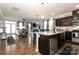 Open concept kitchen and living area with an island at 14217 Ridgewater Way, Charlotte, NC 28278