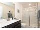 Clean bathroom with shower, toilet and modern vanity at 14217 Ridgewater Way, Charlotte, NC 28278