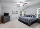 Spacious bedroom with a king-size bed and large windows at 1516 Candlewyck Ct, Kannapolis, NC 28081