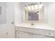 Bathroom with white vanity, mirror, and light fixture at 8017 Regent Park Ln, Charlotte, NC 28210