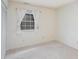 Bright bedroom with neutral walls and window with curtains at 8017 Regent Park Ln, Charlotte, NC 28210