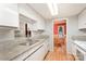 Kitchen with granite countertops and a view into dining area at 8017 Regent Park Ln, Charlotte, NC 28210