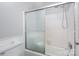 Clean bathroom with a shower/tub and white tile at 8017 Regent Park Ln, Charlotte, NC 28210