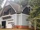 Two-story detached garage/shop with upper level living space at 1409 Trinity Church Rd, Monroe, NC 28112