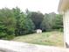 Large backyard with shed and wooded area at 8885 Brandon Cir, Concord, NC 28025