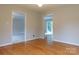 Dining Room with hardwood floors and views of the backyard and living room at 8885 Brandon Cir, Concord, NC 28025