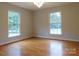 Dining room with hardwood floors and a view of the kitchen at 8885 Brandon Cir, Concord, NC 28025