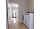 Bright laundry room with washer, dryer, and access to other areas at 8885 Brandon Cir, Concord, NC 28025