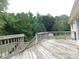 Spacious wooden deck overlooks a private wooded backyard at 8885 Brandon Cir, Concord, NC 28025