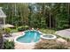 Freeform pool and spa with patio and landscaping at 130 Bagby Rd, Mooresville, NC 28117