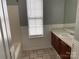 Simple bathroom with a tub, shower, and vanity at 4845 Chesney Nw St, Concord, NC 28027