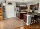 Kitchen features granite island, breakfast bar, and stainless steel appliances at 4845 Chesney Nw St, Concord, NC 28027