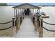 Private boat dock with covered slip and waterfront access at 203 High Lake Dr, Statesville, NC 28677