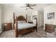 Bedroom with king-size bed and hardwood floors at 203 High Lake Dr, Statesville, NC 28677