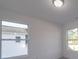 Bedroom with two windows and grey carpet at 560 Geneva Cir, Gastonia, NC 28056