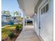 Front porch with white door and street view at 560 Geneva Cir, Gastonia, NC 28056
