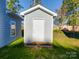 Exterior photo of a detached shed with a white door at 560 Geneva Cir, Gastonia, NC 28056