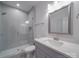 Bathroom with a walk-in shower and grey vanity at 560 Geneva Cir, Gastonia, NC 28056