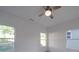 Spacious bedroom with three windows and ceiling fan at 560 Geneva Cir, Gastonia, NC 28056