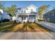 Two-story house exterior with landscaping and driveway at 560 Geneva Cir, Gastonia, NC 28056
