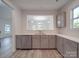 Modern kitchen with gray cabinets and quartz countertops at 560 Geneva Cir, Gastonia, NC 28056