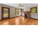 Living room with hardwood floors and brick fireplace at 2523 Kool Park Ne Rd, Hickory, NC 28601