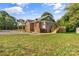Brick house exterior with gray siding, deck, and detached shed at 2523 Kool Park Ne Rd, Hickory, NC 28601