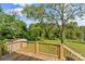 Wooden deck overlooking a fenced backyard at 2523 Kool Park Ne Rd, Hickory, NC 28601