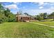 Charming brick house with a grassy yard and walkway at 2523 Kool Park Ne Rd, Hickory, NC 28601