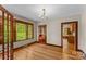 Hardwood floor dining room with French doors at 2523 Kool Park Ne Rd, Hickory, NC 28601