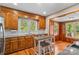 Kitchen with wood cabinets, granite counters & island at 2523 Kool Park Ne Rd, Hickory, NC 28601