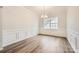 Formal dining room with hardwood floors, wainscoting, and chandelier at 4457 Doyle Ridge Rd, Maiden, NC 28650