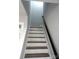 Modern staircase with dark wood and white risers at 212 James St # 16, Kannapolis, NC 28083