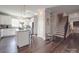 Modern kitchen with white cabinets, granite countertops, and island at 3810 New Salem Rd, Monroe, NC 28110