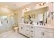 Elegant bathroom with double vanity, large mirror, and a walk-in shower at 113 Goodson Pl, Davidson, NC 28036