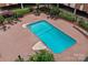 Overhead view of refreshing swimming pool and patio area at 1300 Queens Rd # 408, Charlotte, NC 28207