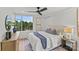 Comfortable bedroom with a dresser and large window at 1300 Queens Rd # 408, Charlotte, NC 28207