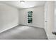 Simple bedroom with grey carpet and a window at 325 Pelling Dr, York, SC 29745