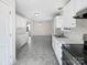 Modern kitchen with white cabinets and stainless steel appliances at 325 Pelling Dr, York, SC 29745