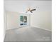 Bright bedroom with neutral wall paint, gray carpeting, and ceiling fan at 325 Pelling Dr, York, SC 29745