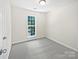 Bright bedroom with grey carpet and large window at 325 Pelling Dr, York, SC 29745