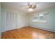 Bedroom featuring hardwood floors and ample closet space at 900 Nance St, Kannapolis, NC 28083