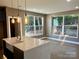 Modern kitchen with quartz countertops, stainless steel appliances, and a large island at 1243 10Th Street Nw Pl, Hickory, NC 28601