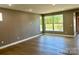 Bright and spacious living room with hardwood floors and large windows at 1243 10Th Street Nw Pl, Hickory, NC 28601