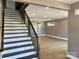 Contemporary staircase with dark wood and metal accents at 1243 10Th Street Nw Pl, Hickory, NC 28601